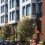 Multigenerational affordable housing community built around transport hub